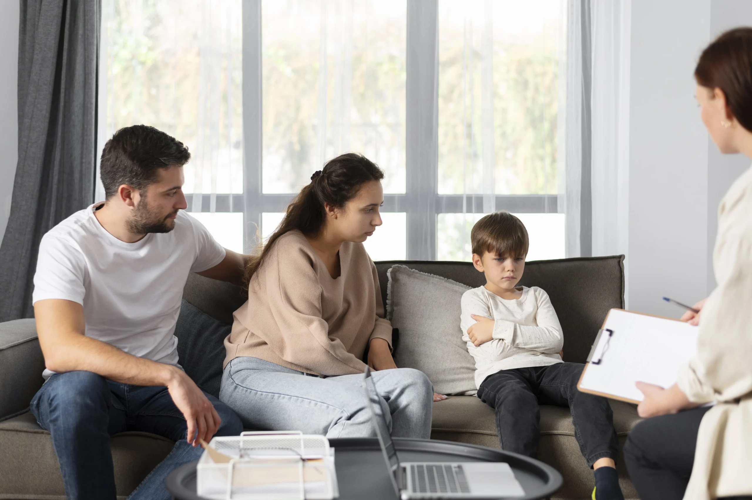 close up family discussing with therapist min scaled 2
